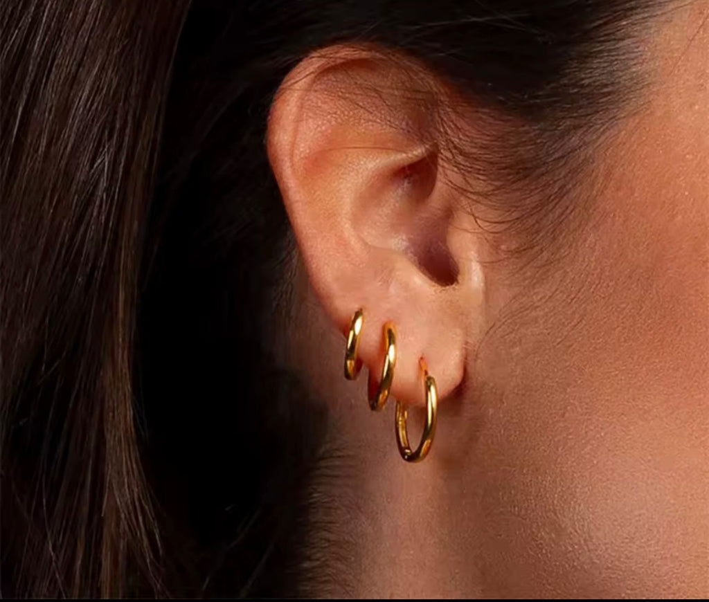Tres aretes argolla oro 14K triple piercing mujer